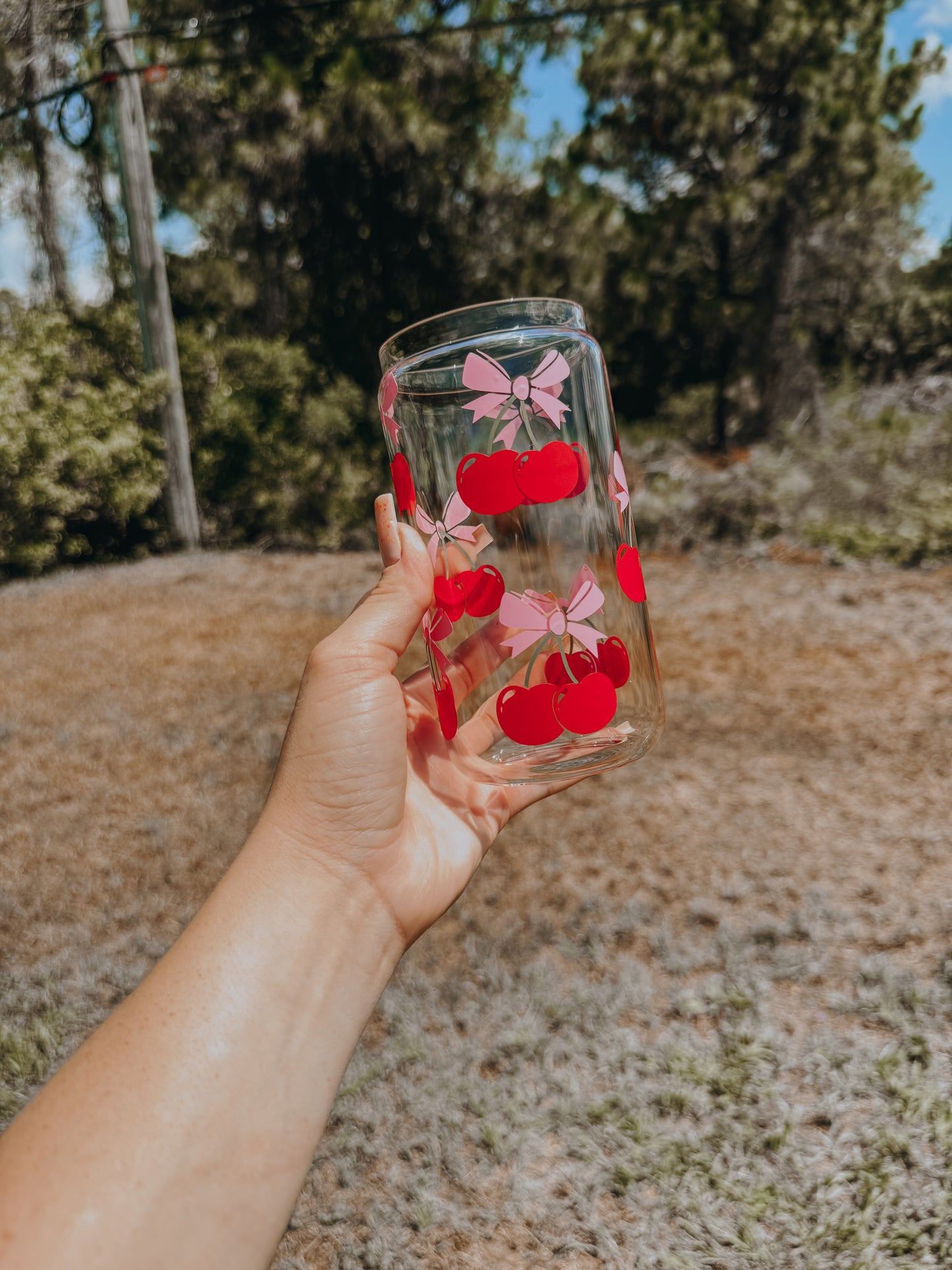 Cherry bows can glass