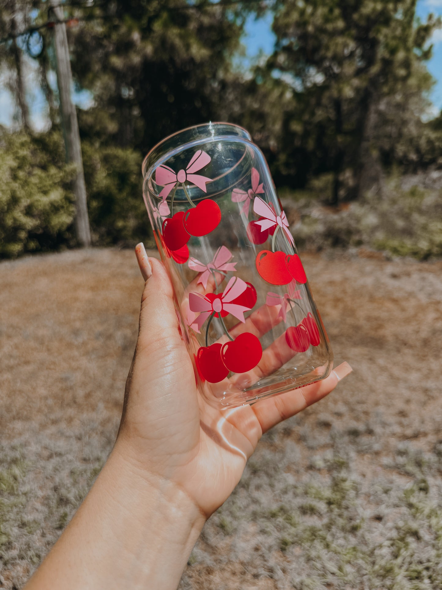 Cherry bows can glass